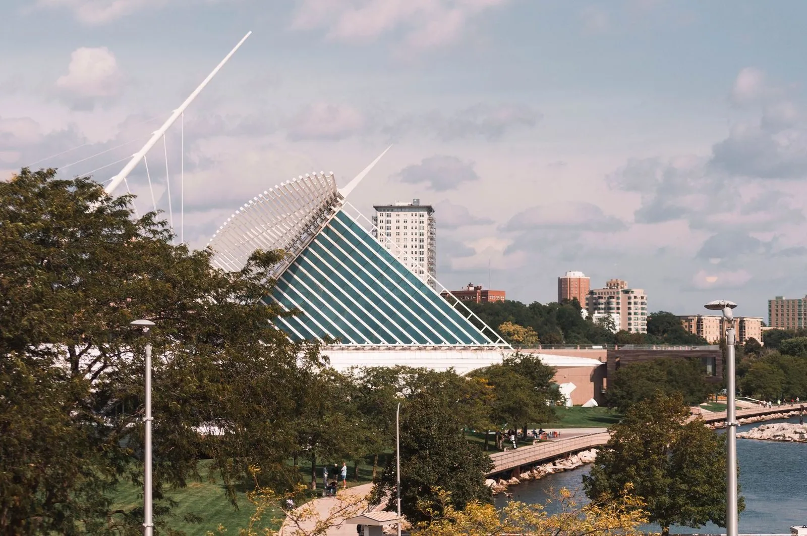 The Milwaukee lakefront with the white wings of the art museum open